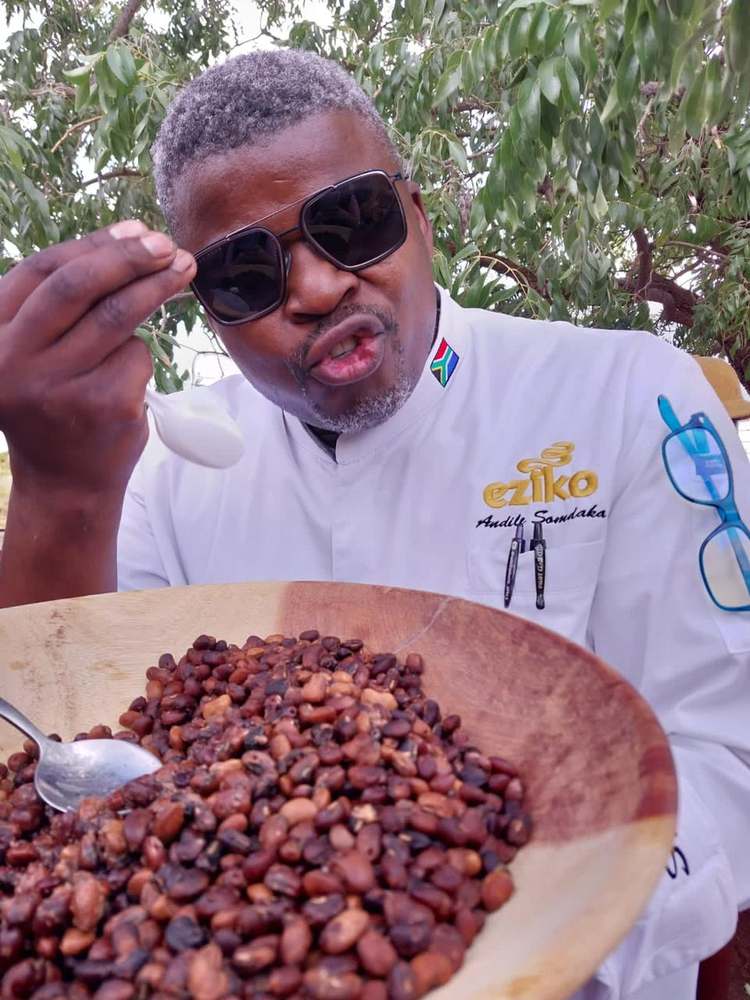 Chef Andile with a harvest of dried beans