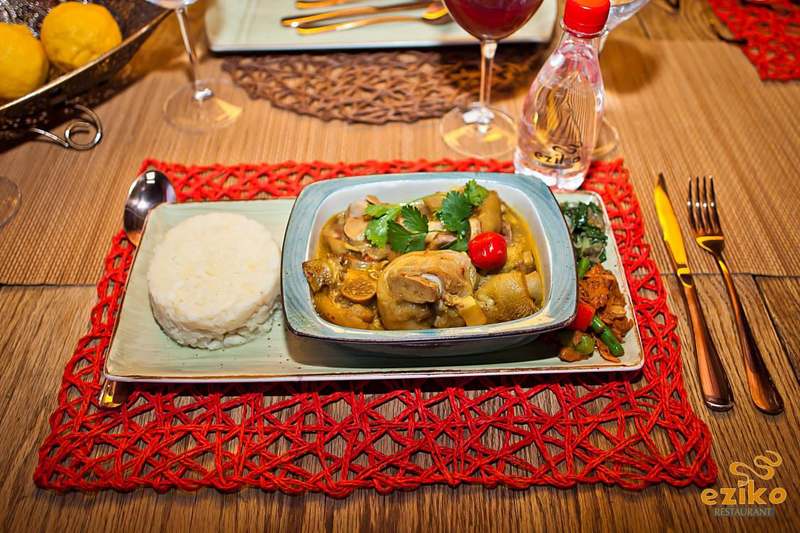 Chicken curry with steamed rice, formal table setting