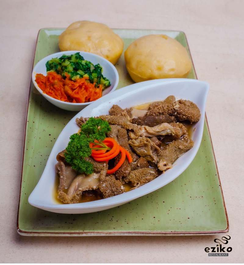 Mogodu tripe with steamed dumplings, chakalaka and imifino
