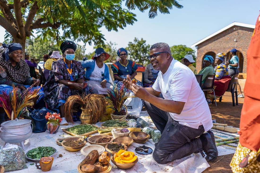 Chef Andile sourcing ingredients with the community